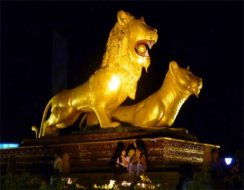 the golden lions circle at night in sihanoukville, cambodia